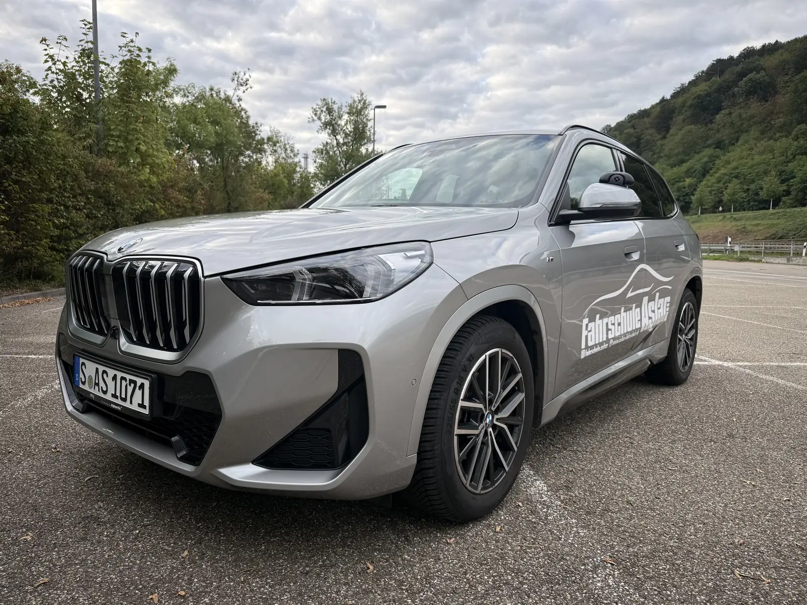 Aslan Driving School’s car, side view